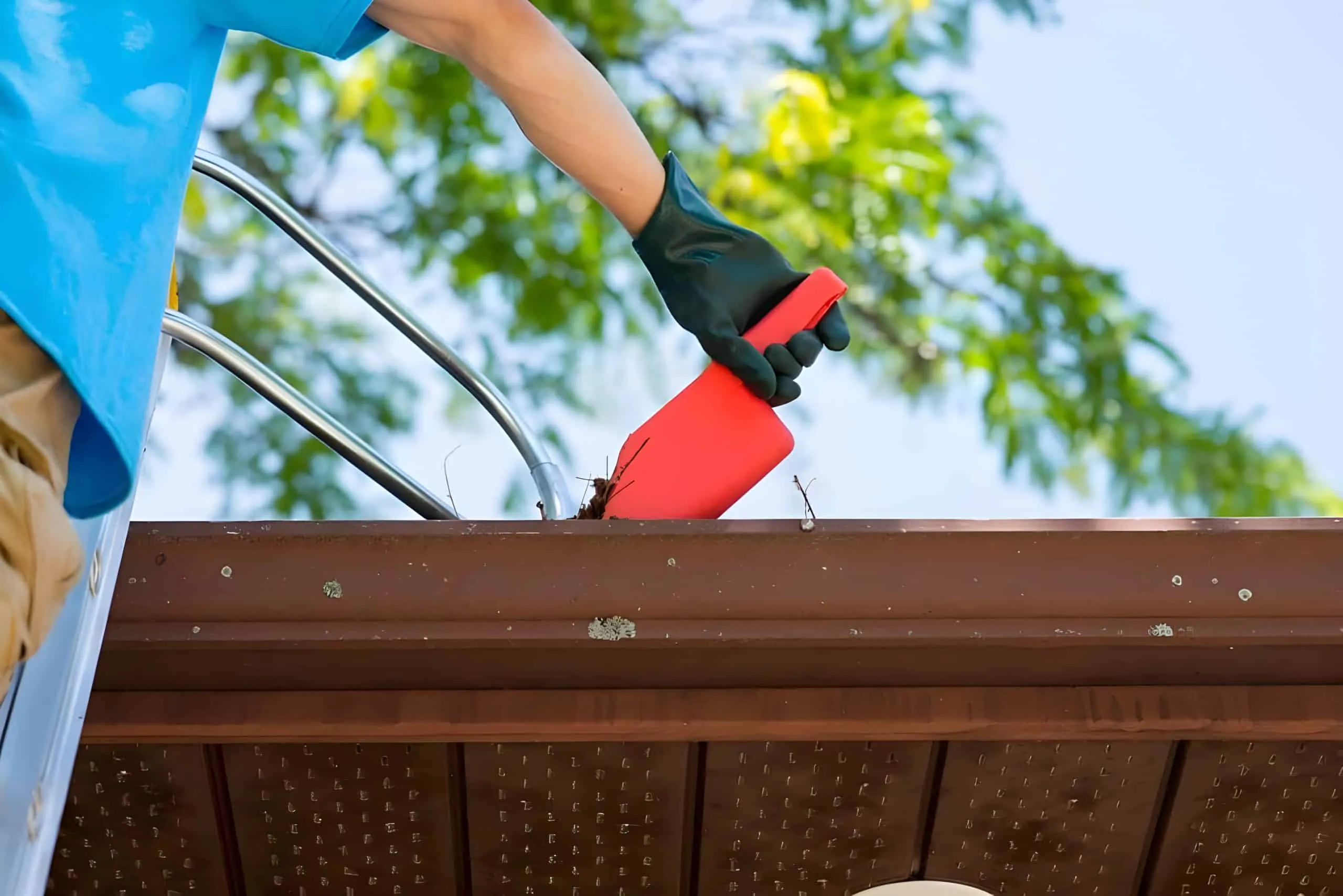 Gutter cleaning by Nate’s Window Cleaning in California. Expert gutter maintenance to prevent water damage.