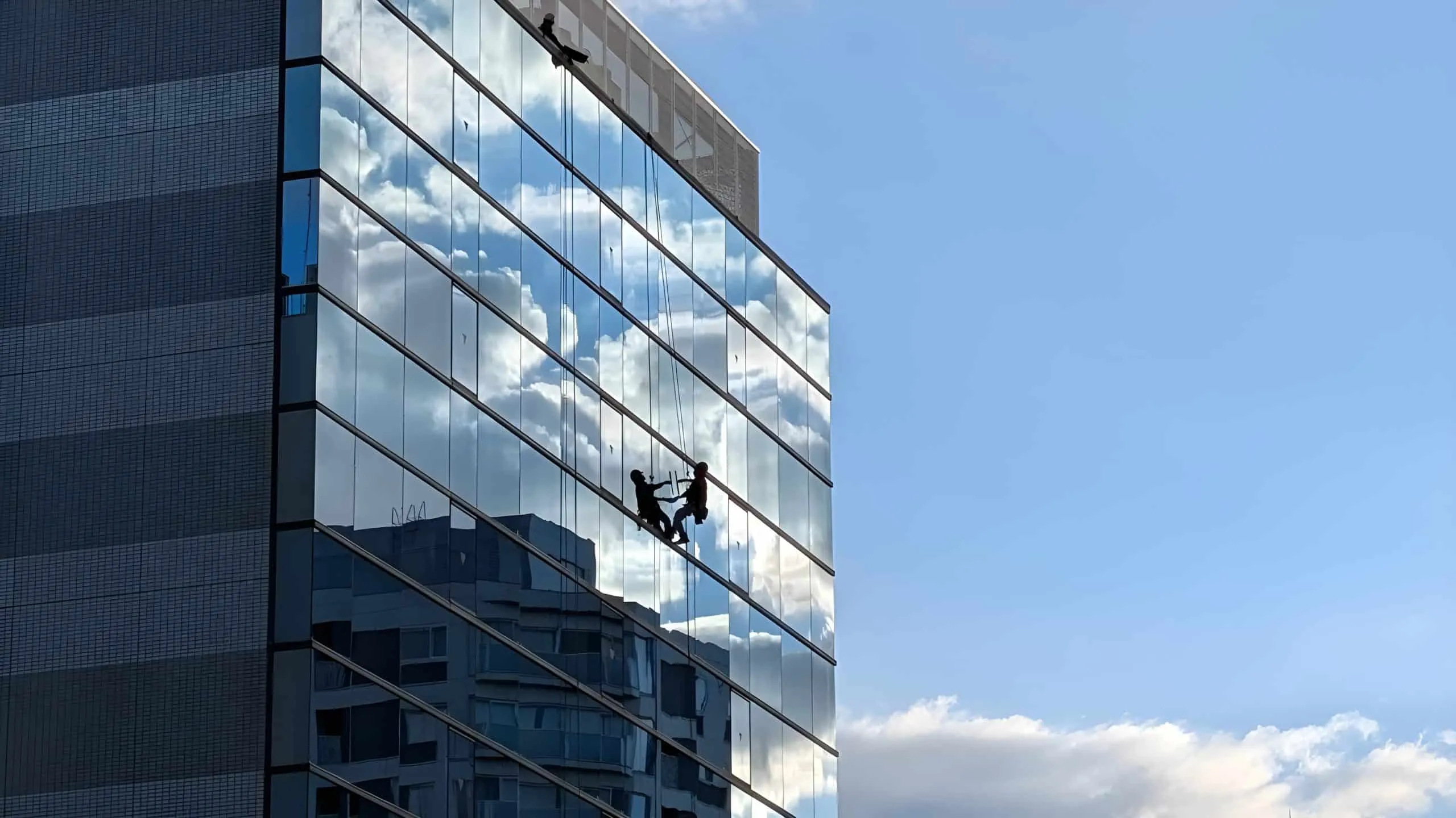 High-rise window cleaning service for commercial buildings.